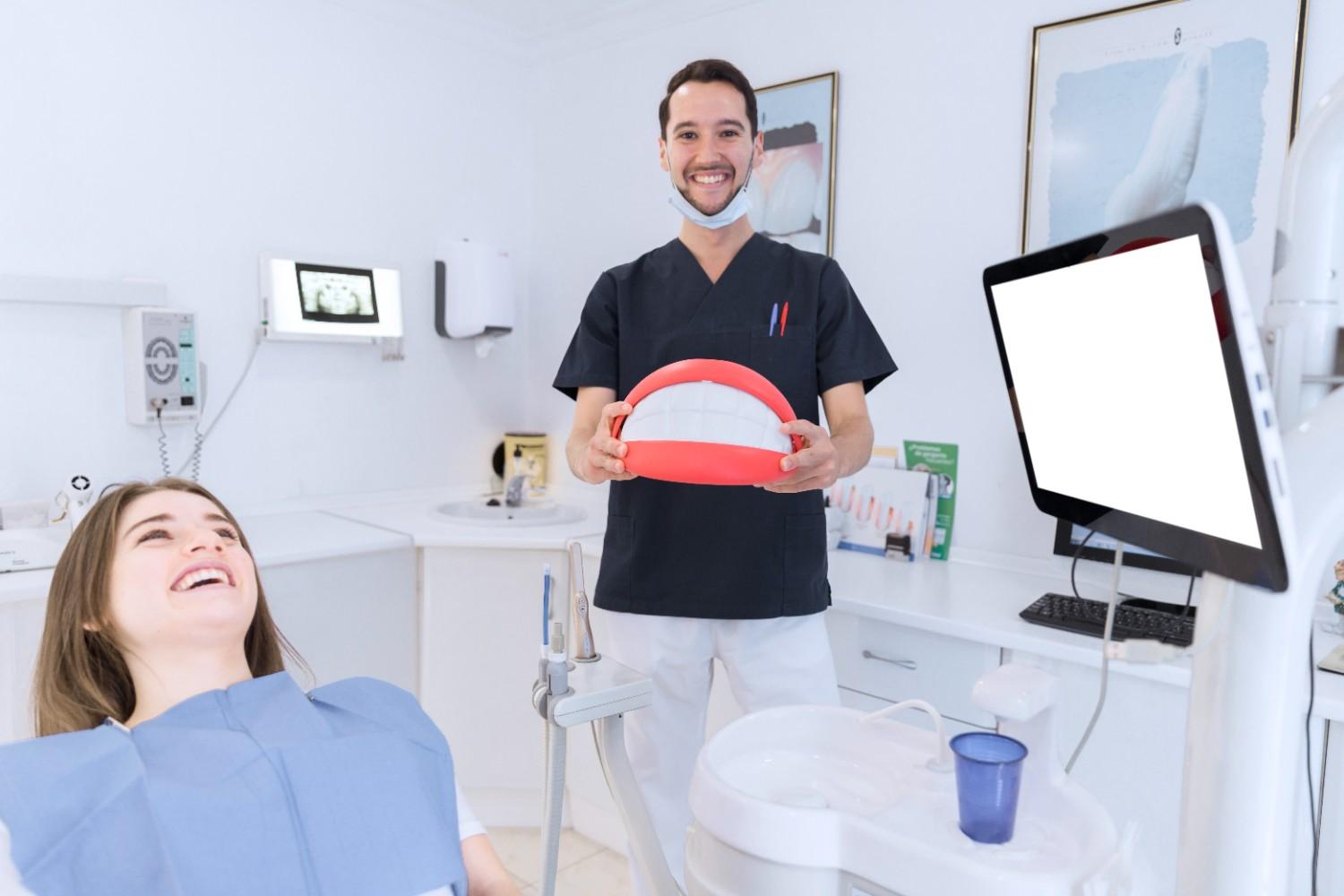 dentist explaining teeth straightening options to an adult patient
