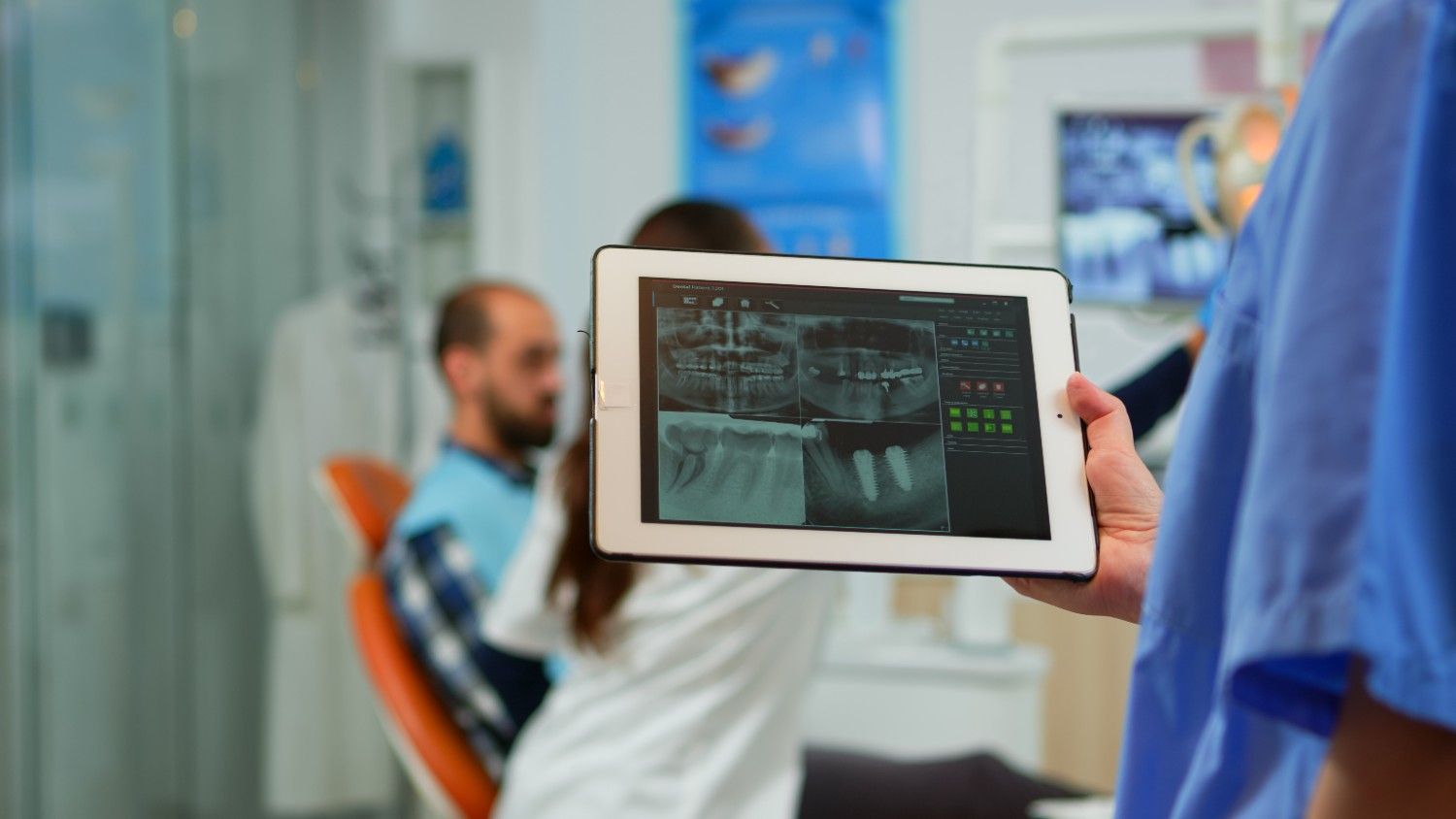Dental X-ray being reviewed during a patient consultation